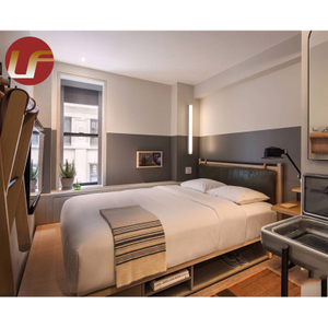 La chambre à coucher de taille de reine de suites de Staybridge place des meubles de luxe de chambre à coucher d'hôtel